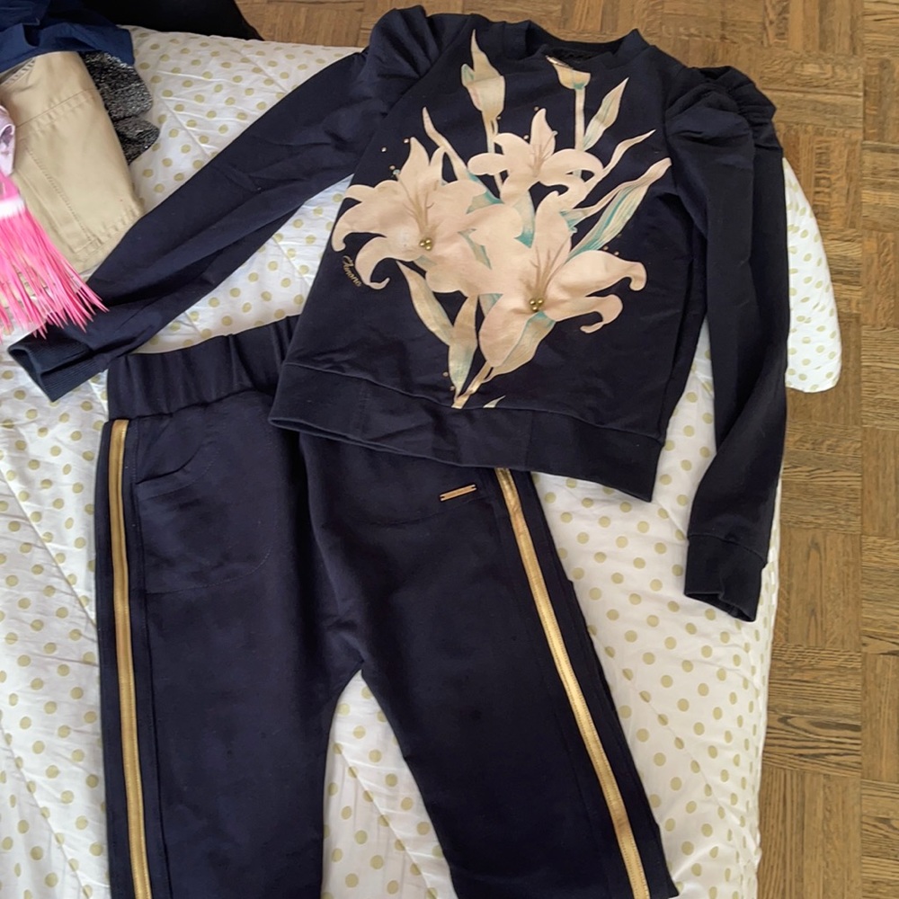Junona girls sweat set with small stain on pant